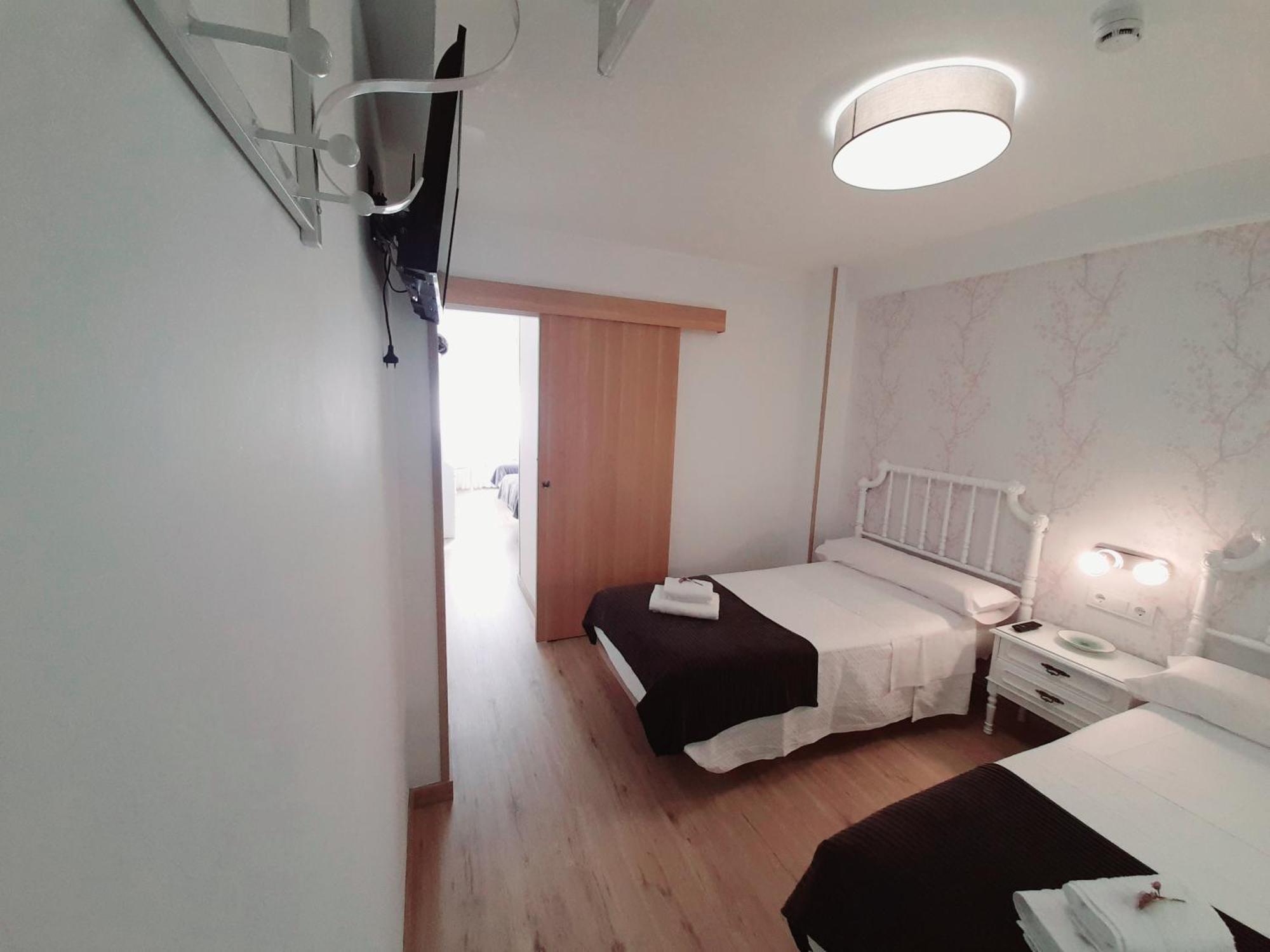 Pensión Ferradura Melide Habitación foto